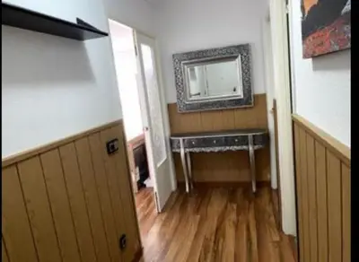 a bathroom with a sink and a mirror on the wall at Excelente piso en San Fernando in San Fernando