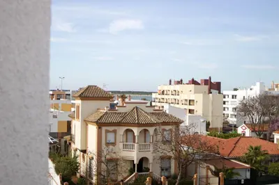 a view of a city with buildings at Apartamento Piletas in Sanlúcar de Barrameda
