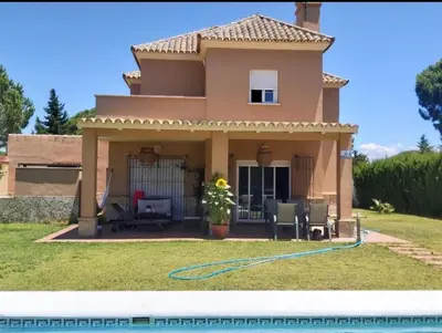 a house with a pool in front of it at VILLA DEL MAR in Novo Sancti Petri