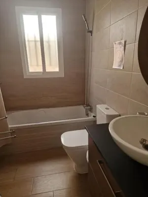 a bathroom with a tub and a toilet and a sink at VILLA ESTRELLA in Inmaculada