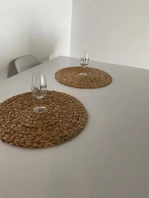 two wine glasses sitting on top of a table at Apartamento Peonía in Jerez de la Frontera