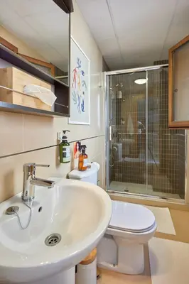 a bathroom with a sink and a toilet at Apartamento Obispo centro Jerez de la Frontera in Jerez de la Frontera