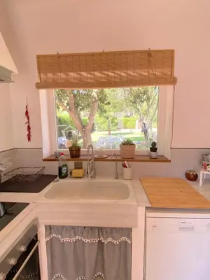 a kitchen with a sink and a window at Tierra del Sur in Conil de la Frontera