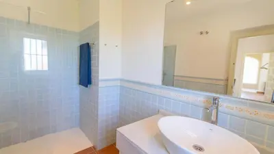 a bathroom with a sink and a mirror at Finca Las Encinillas Arcos de la Frontera by Ruralidays in Arcos de la Frontera