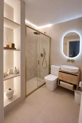 a bathroom with a shower and a toilet and a sink at Villa Tropical a 2 minutos del Faro de Chipiona in Chipiona