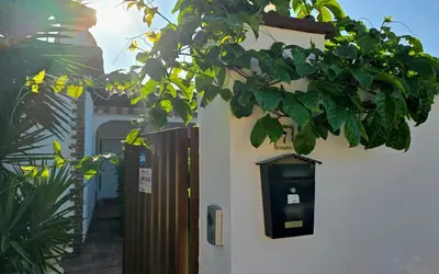a building with a mail box on the side of it at HAPPY HOMES CASA LIMÓN - Premium - Pool - Klimaanlage - WLAN in Chiclana de la Frontera