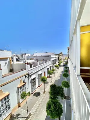 a view of a city street with buildings and trees at Apartamento en el centro San Fernando Cadiz. in San Fernando