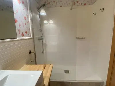 a bathroom with a shower and a sink at Apartamento primera linea de playa reformado en Las Redes in El Puerto de Santa María