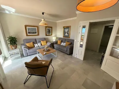 a living room with a couch and a table at Mirador de Sanlucar 6 in Sanlúcar de Barrameda
