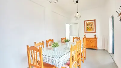 a dining room with a table and chairs at Cortijo de Liche Arcos de la Frontera by Ruralidays in Arcos de la Frontera