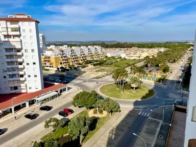an aerial view of a city with buildings and a street at GATU Villa Salada, junto la playa, parking, terraza, aire acc, piscina, wifi Sólo familias o grupos mayores de 21 años in El Puerto de Santa María