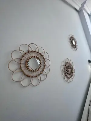 two metal mirrors and a mirror on a wall at GATU PREMIUM Villa Turquesa Playa y Parking in Cádiz