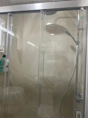 a shower with a glass door in a bathroom at Novo Atlantico Golf 7 in Novo Sancti Petri