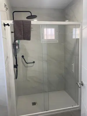 a shower with a glass door in a bathroom at Novo Atlantico Golf 7 in Novo Sancti Petri
