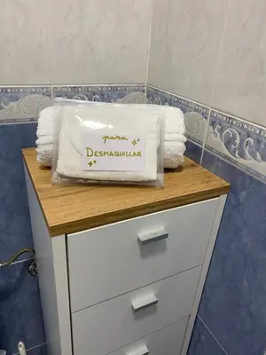 a towel on top of a dresser in a bathroom at LAS 7 ESQUINAS in El Puerto de Santa María