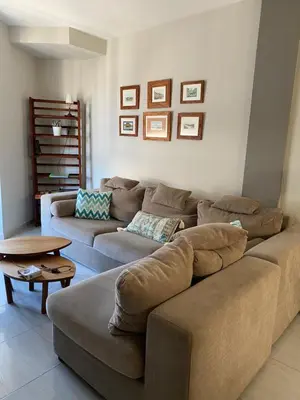 a living room with a couch and a table at LAS 7 ESQUINAS in El Puerto de Santa María
