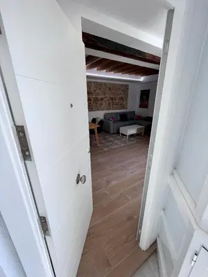 a view of the living room from the hallway of a house at GATU PREMIUM Villa Flamenca , Preferente mayores de 25 años y familias in Cádiz
