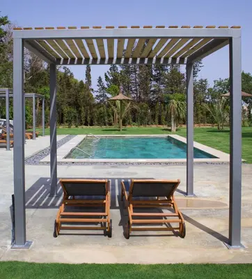 a pergola with two chairs and a pool at Alojamiento rural FINCA AZUCENA SUITE only adults in Conil de la Frontera