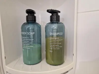 two bottles of soap sitting in a refrigerator at DULCE CARMEN in Bonanza