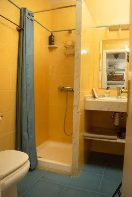 a bathroom with a shower and a sink and a toilet at Duplex Las Torres La Barrosa 3Beds - A 700m de la playa in Chiclana de la Frontera