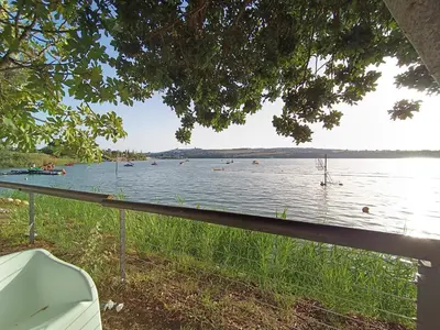 a view of a lake with boats in the water at Apartamento 29 in Arcos de la Frontera
