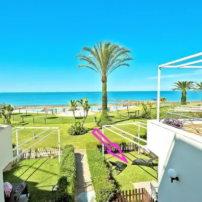 On Beach Deluxe Apartment with Pools and own Garden