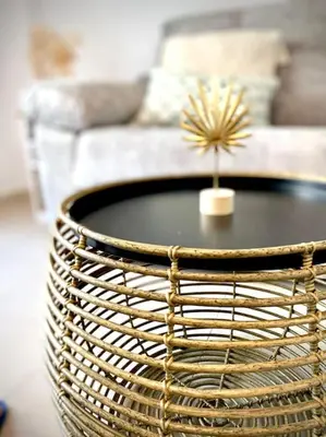 a coffee table in a living room with a couch at MyChoice Alegria in Rota