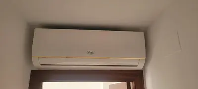 a ceiling with a white stove in a room at Apartamento Jilguero con parking individual privado in Sanlúcar de Barrameda