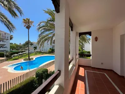 a view of a swimming pool from a house at costa ballena elite in Costa Ballena