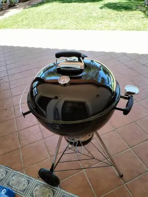 a grill sitting on top of a tiled floor at Chalet Urb Doña Violeta 500m Mar in Chiclana de la Frontera