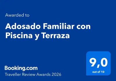 a blue sign with the words aloszo famosa familia penza at Adosado Familiar con Piscina y Terraza in Cádiz