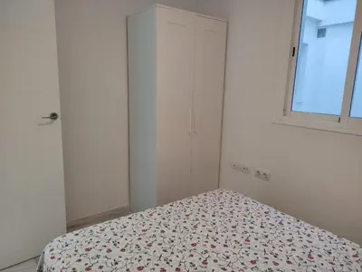 a bedroom with a bed and a window at Barrameda 19 in Sanlúcar de Barrameda