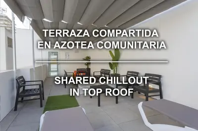 a room with a table and chairs in a room at Estudio Amor BRUJO by Cadiz4Rentals in Cádiz