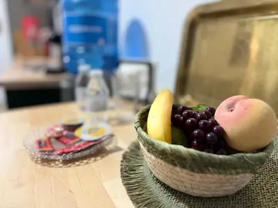 a bowl of fruit sitting on a table at Apartamento Boutique Kala Ático in Jerez de la Frontera