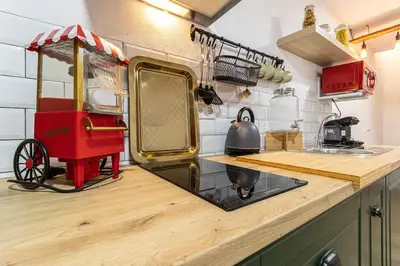 a kitchen with a cart on the counter at Apartamento Boutique Kala Ático in Jerez de la Frontera