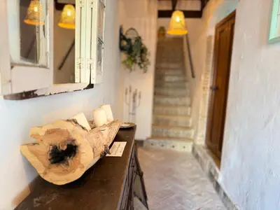 a room with a table with a piece of wood on it at Apartamento Boutique Kala Ático in Jerez de la Frontera
