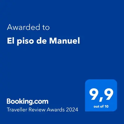 a blue screen with the text awarded to el pizza de manuel at El piso de Manuel in Sanlúcar de Barrameda