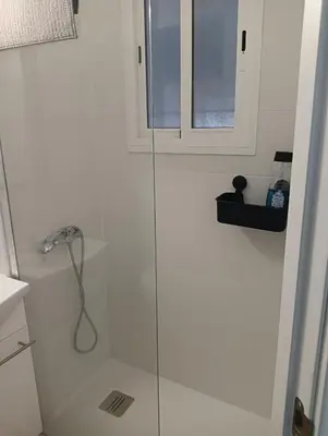 a shower with a glass door in a bathroom at 3 bedroom Apartment in San Fernando in San Fernando