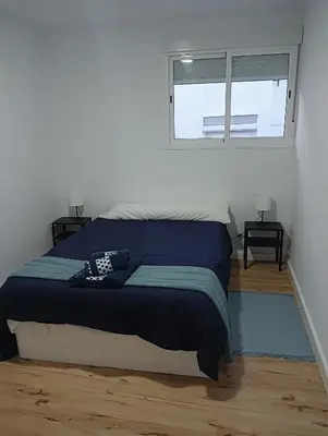 a bedroom with a bed with a window at 3 bedroom Apartment in San Fernando in San Fernando