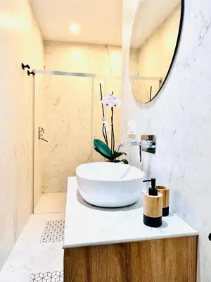 a bathroom with a large bowl sink on a counter at inncadiz Casa Los Balbos in Cádiz