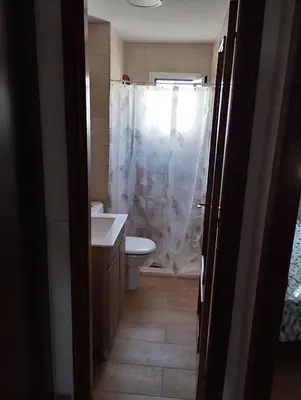 a bedroom with two bunk beds in a room at Casa juani in Rota