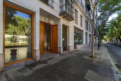 an empty street with a row of buildings at Allo Apartments Santo Domingo Parking 2 Habitaciones in Jerez de la Frontera