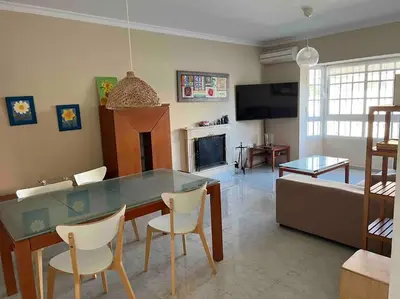 a living room with a glass table and a couch at APOLO in Chiclana de la Frontera
