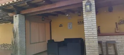 a garage with a garage door and a building at Casa Ye Ye in Novo Sancti Petri