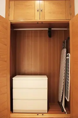 a cabinet with a bunch of drawers in it at Fancy apartment in a Historic house, Chiclana City Center by C. Dreams in Chiclana de la Frontera