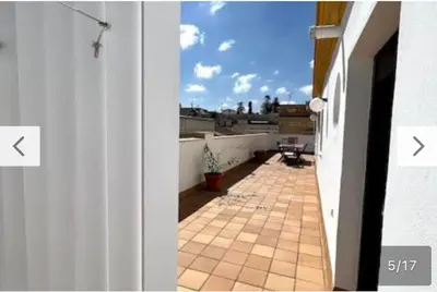 a view of a balcony of a house at Ático céntrico con terraza privada y plaza de garaje in Sanlúcar de Barrameda