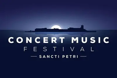 a sign that reads concert music festival at night at Enjoy the historic center of Chiclana By C. Dreams in Chiclana de la Frontera