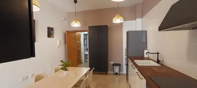 a kitchen with a sink and a counter top at Apartamento Pale Cream in Jerez de la Frontera