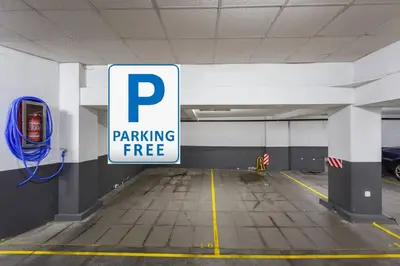 a parking garage with a parking free sign in it at Cielo gaditano in Cádiz