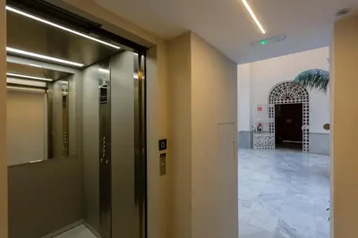 a hallway with a door leading into a building at Casa Manuel de Falla by Cadiz4Rentals in Cádiz